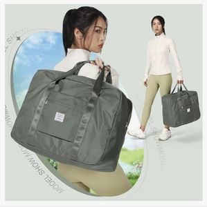 Weekender travel bag in light gray/ green color